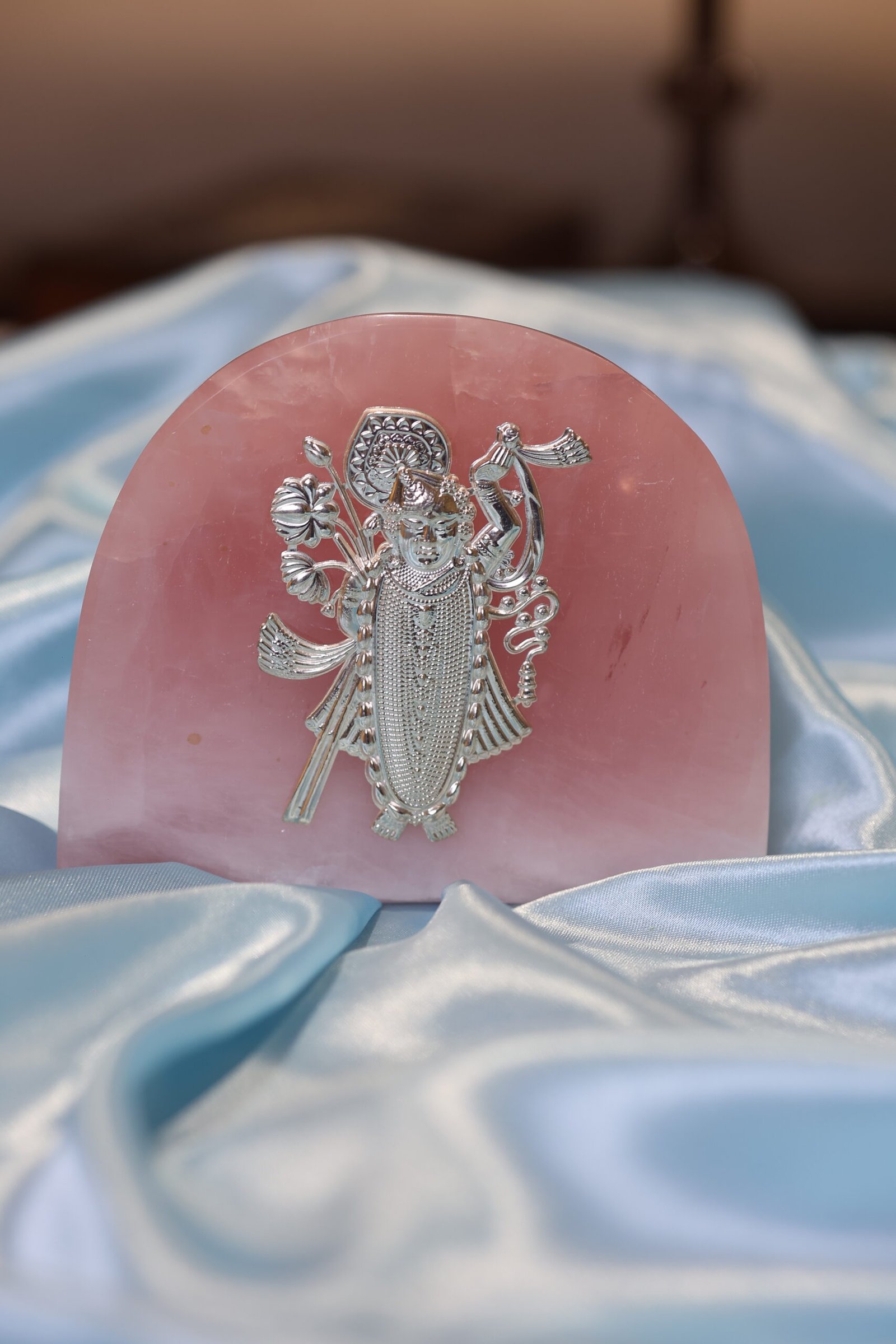 Pure Silver Shrinathji Idol on Natural Rose Quartz